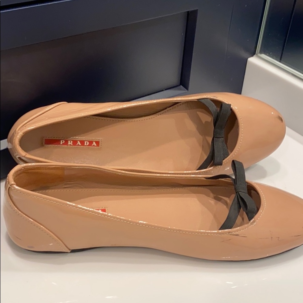 Prada flat patent nude with black